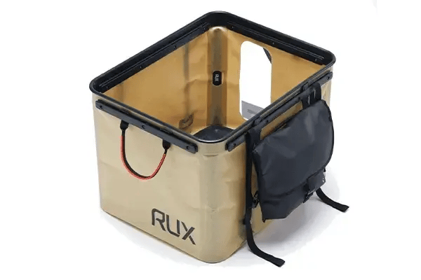 The RUX 70L, Waterproof Bag, and RUX Pocket organizing your camping gear