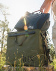 Green RUX Essentials Set Bundle. Pulling Bag out of RUX 70L